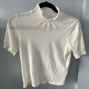 Ruffle turtle neck tee in size XS